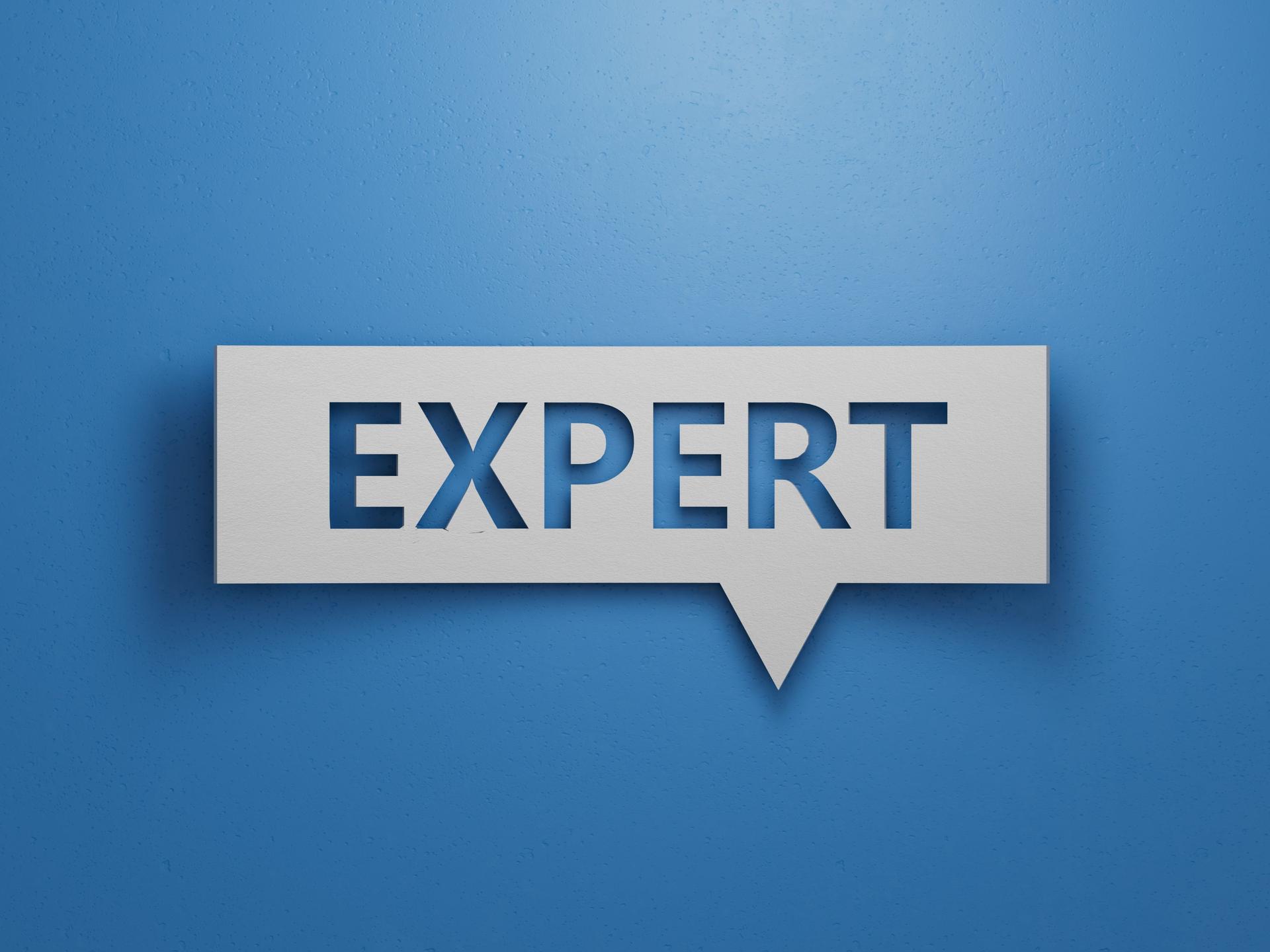 Speech Bubble block with EXPERT business word. Mission.Minimalist Abstract Design With White Cut Out Paper.3D rendering on blue background.