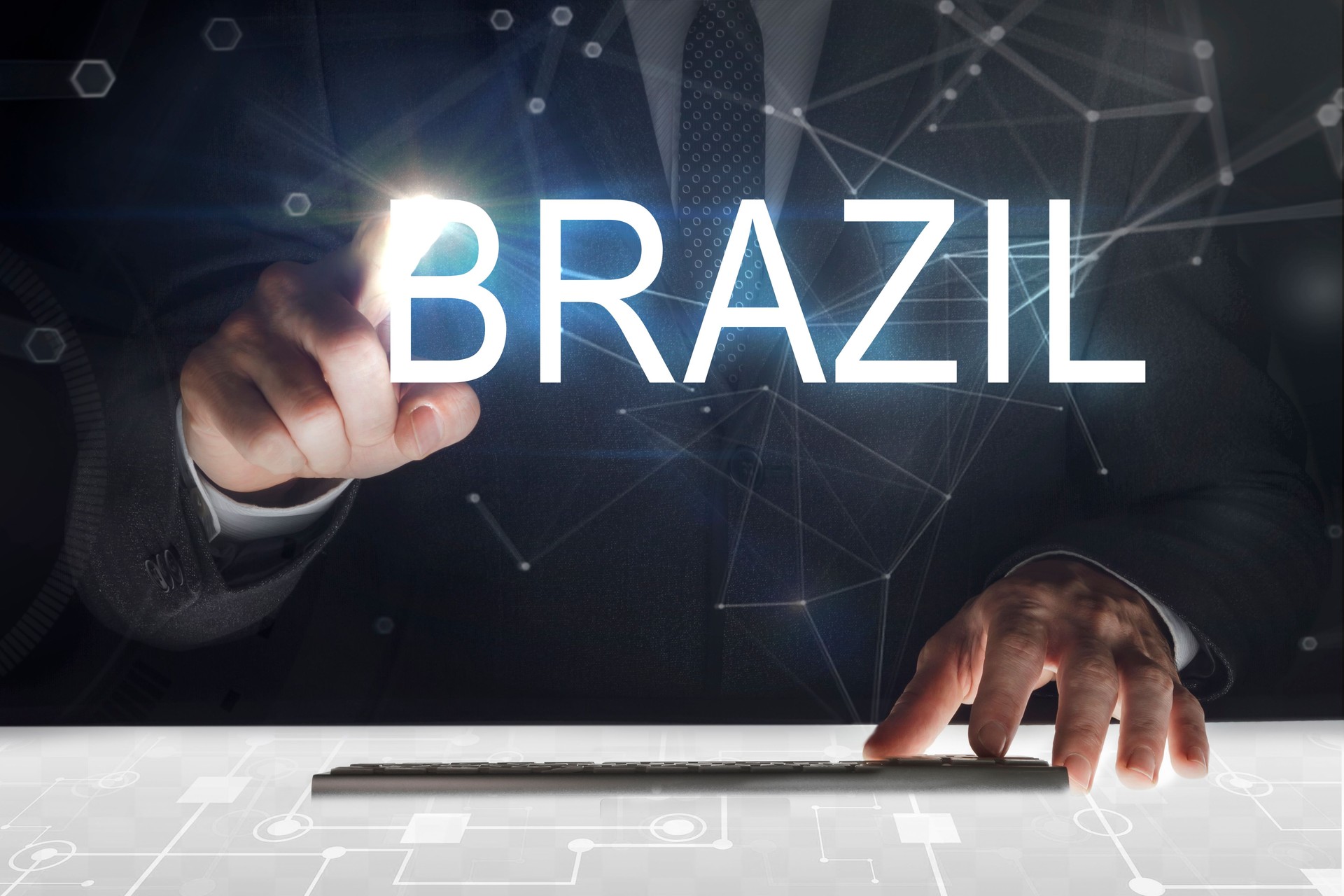 Business man touching screen with "Brazil" writing